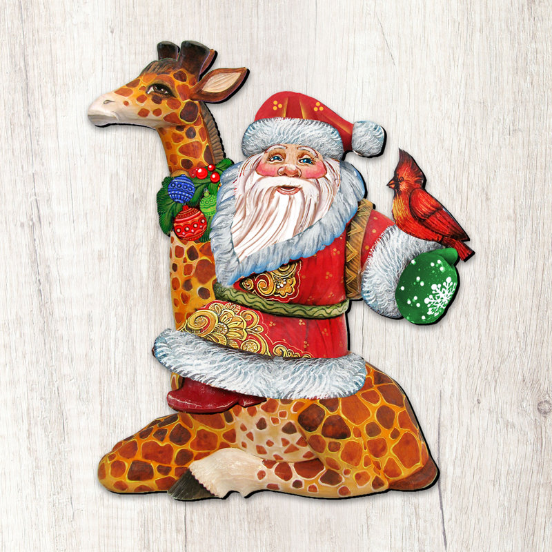 Père noël décoratif sur giraffe