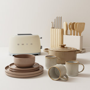 Smeg toaster, dinnerware, cookware, and utensils.