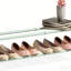 Range-chaussures en métal