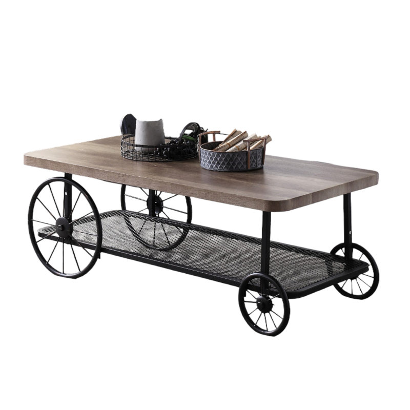 Table basse grise et chêne avec tablette pour un intérieur élégant dans un espace de vie décoratif