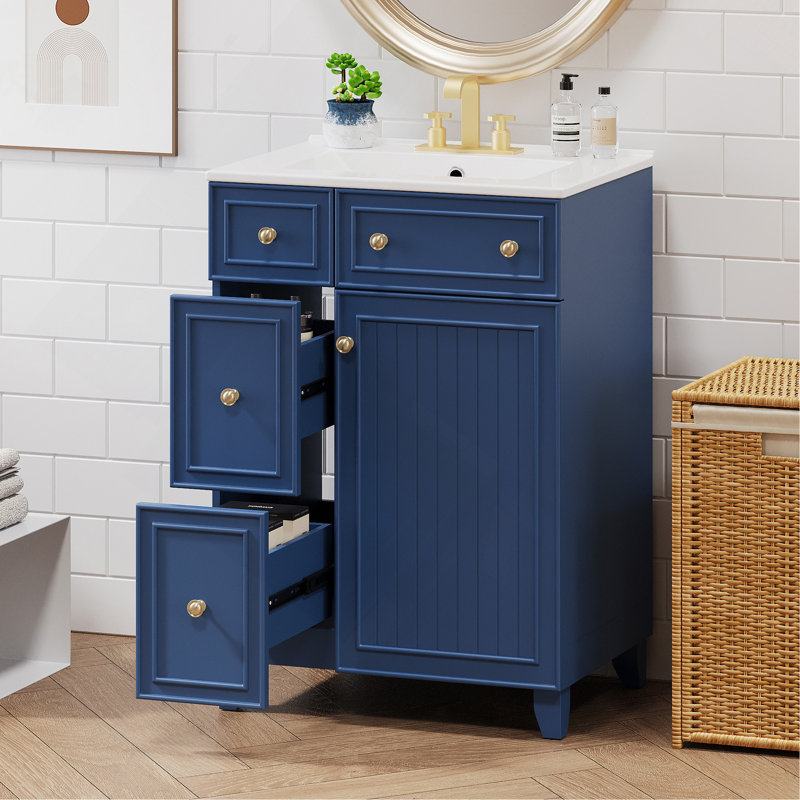 Meuble-lavabo autoportant simple de 61 cm (24 po) avec lavabo en céramique, armoire bleue de style transitionnel avec tiroirs, porte et quincaillerie dorée