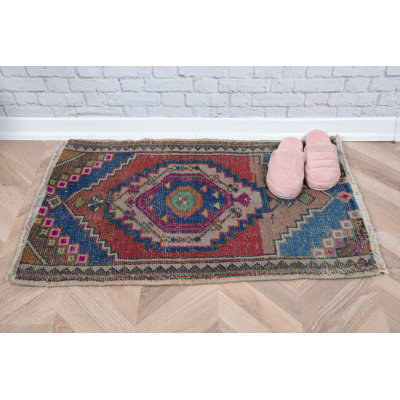 Vintage Turkish Area Rug in Vibrant Red and Blue Accents with Colorful Geometric Pattern for Bohemian Home Decor