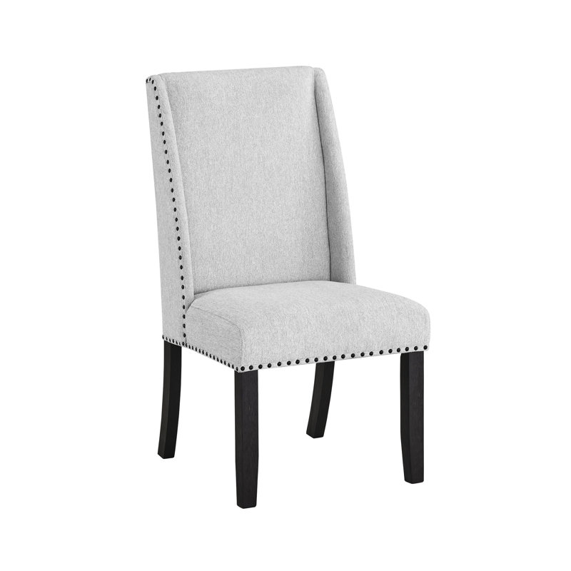 Chaise d'appoint moderne avec finition grise et rembourrage confortable, dossier à oreilles, garniture cloutée élégante