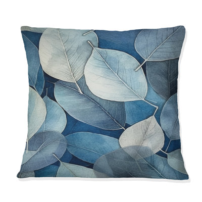 Coussin décoratif à imprimé floral gris et bleu avec feuilles