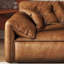 Causeuse-coussin modulaire en similicuir brun