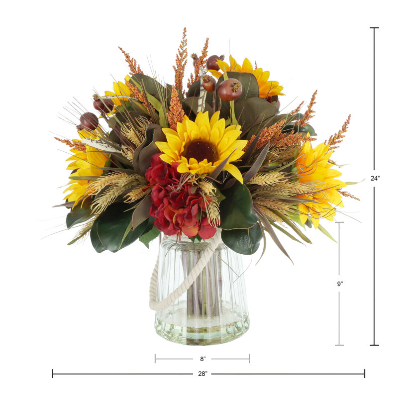 Sunflower, Hydrangea and Pomegranate Fall Arrangement in a Glass Vase