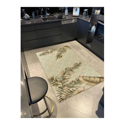 Tapis tissé avec motif géométrique floral