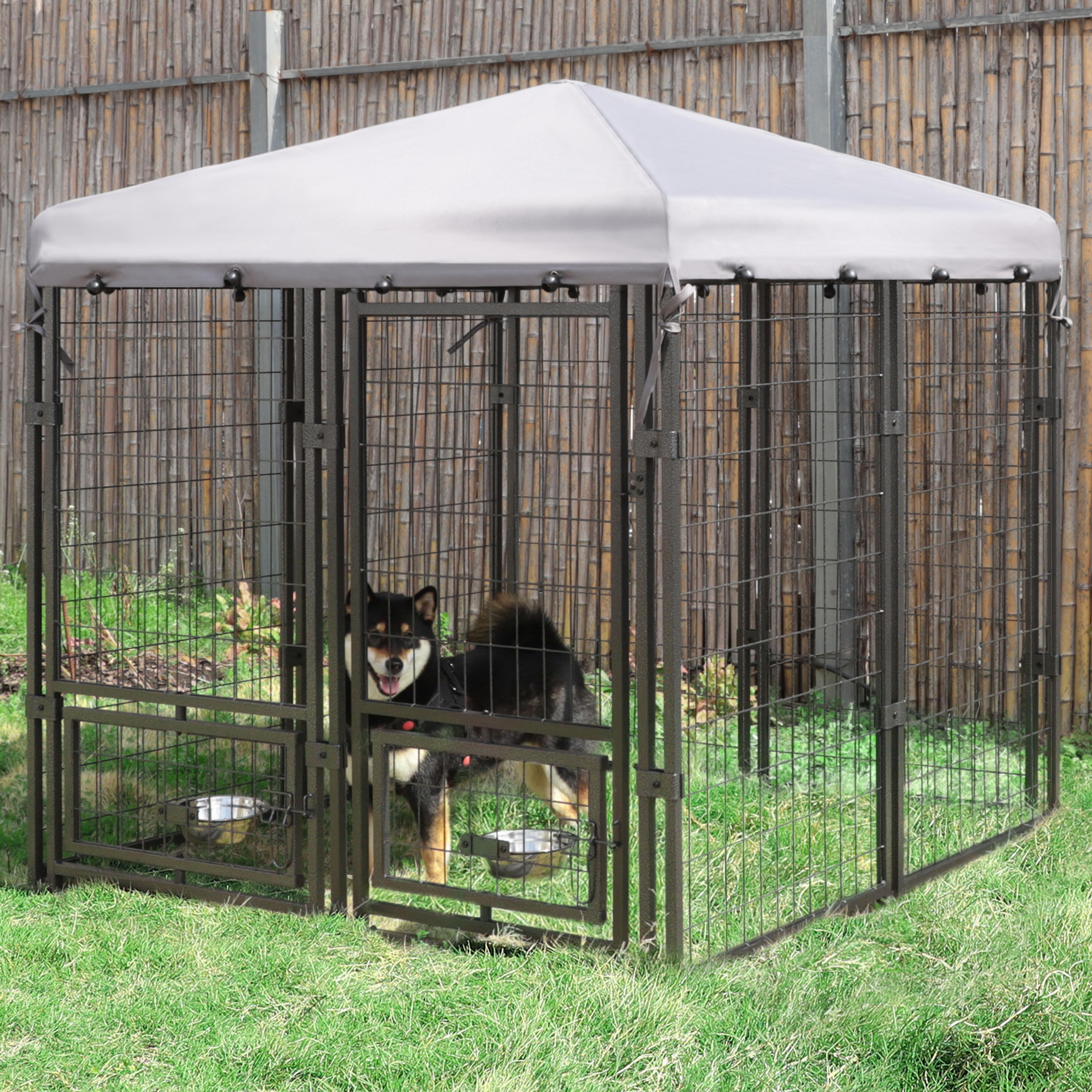 https://assets.wfcdn.com/im/10607978/compr-r85/2372/237267322/outdoor-dog-kennel-with-rotating-feeding-door-dog-enclosure.jpg