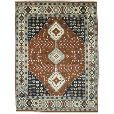 Tapis oriental rouille 9 x 12