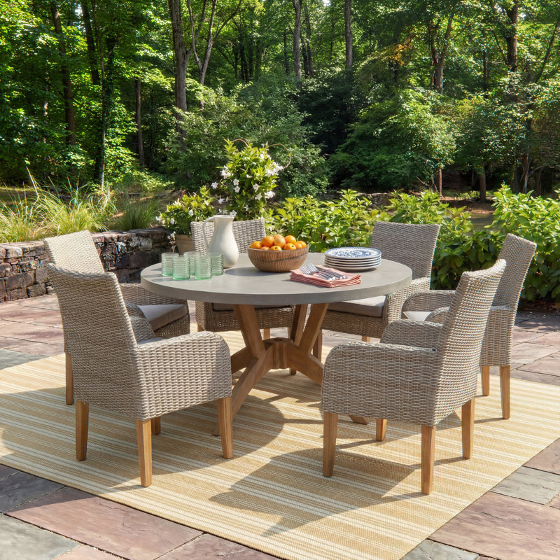 Akiva 6 - Person Teak Patio Dining Set with Round Table , Sunbrella® Cushions Included