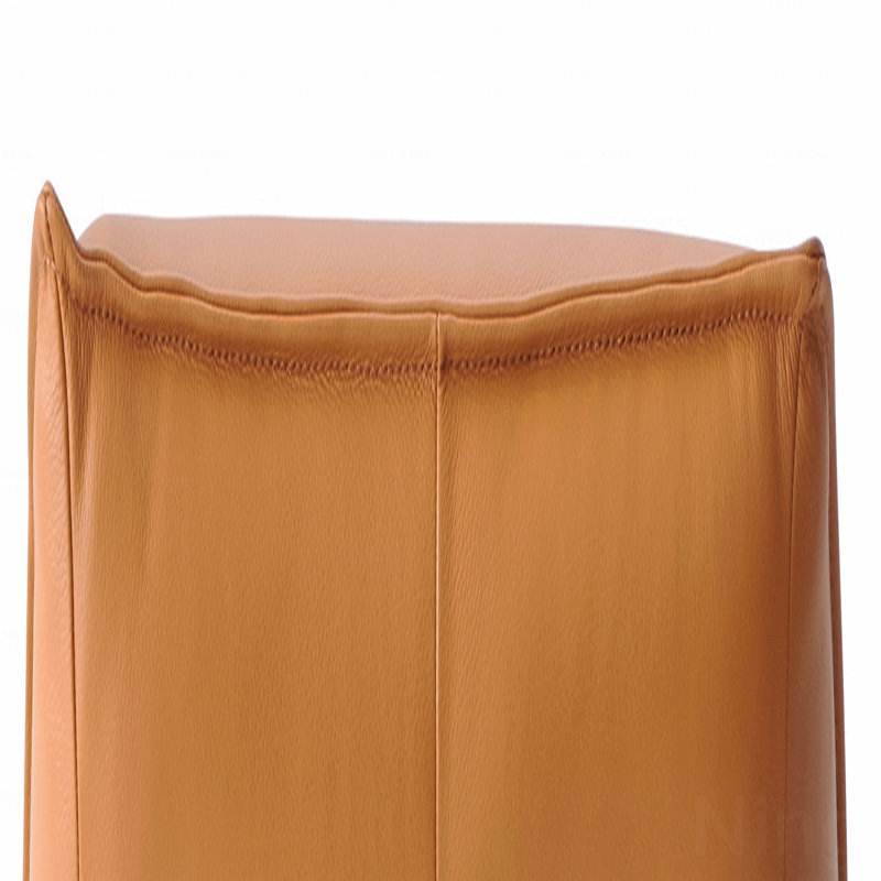Fauteuil d'appoint et repose-pieds en cuir fleur, Grès