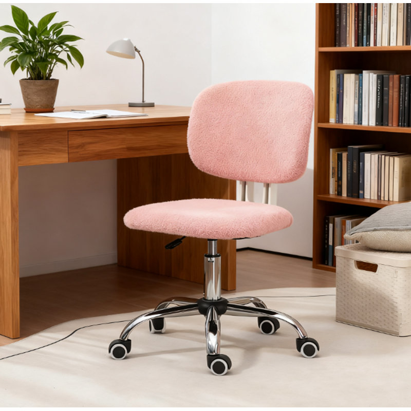 La chaise de bureau rose pour les espaces de travail à la maison tendance offre un confort moelleux et un réglage en hauteur fluide