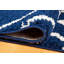 Tapis bleu à motif géométrique-187411538