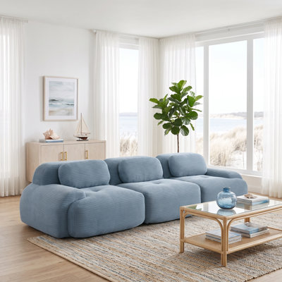 Canapé modulaire 3 places bleu en velours côtelé, profil bas, avec coussins moelleux et accoudoirs incurvés