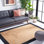 Tapis beige / noir en jute / coton tissé à plat à la main Middleton