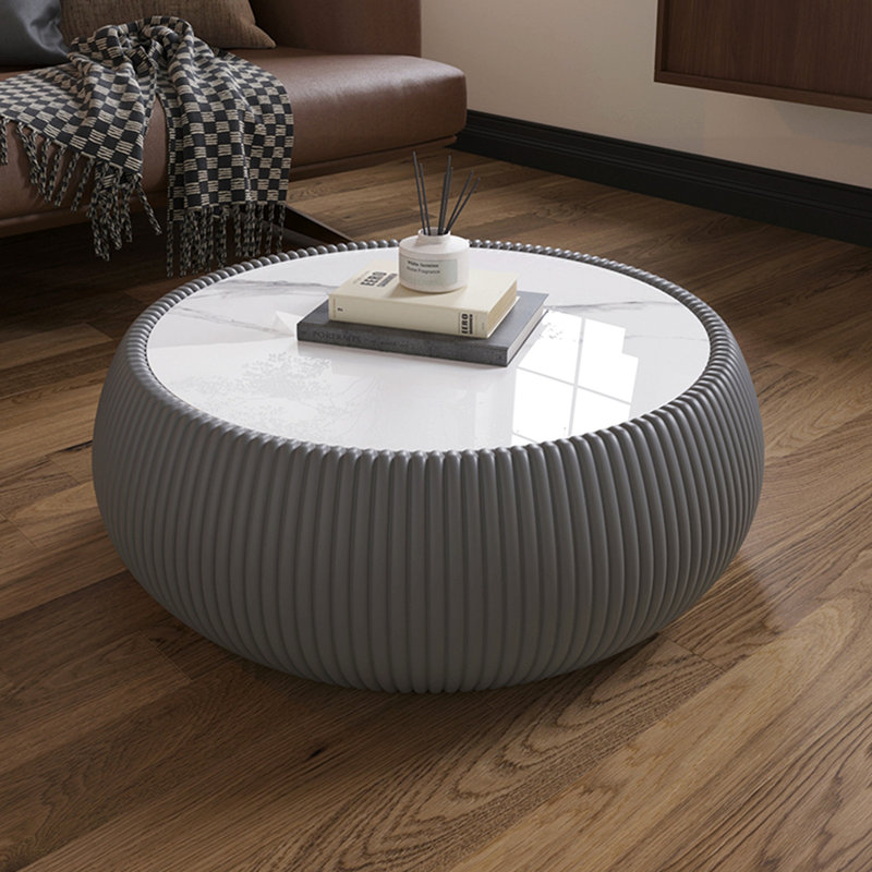 Table basse moderne en cuir fritté clair en forme de tambour pour les meubles de salon (chaque plateau a un motif gris unique)