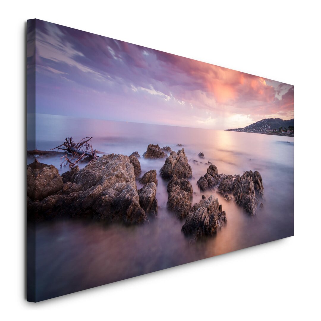 Leinwandbild "Sonnenuntergang am Meer - Felsen am Strand"