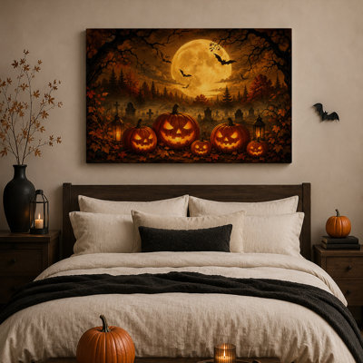 Citrouilles d'Halloween illuminées dans une forêt d'automne avec une toile murale d'Halloween