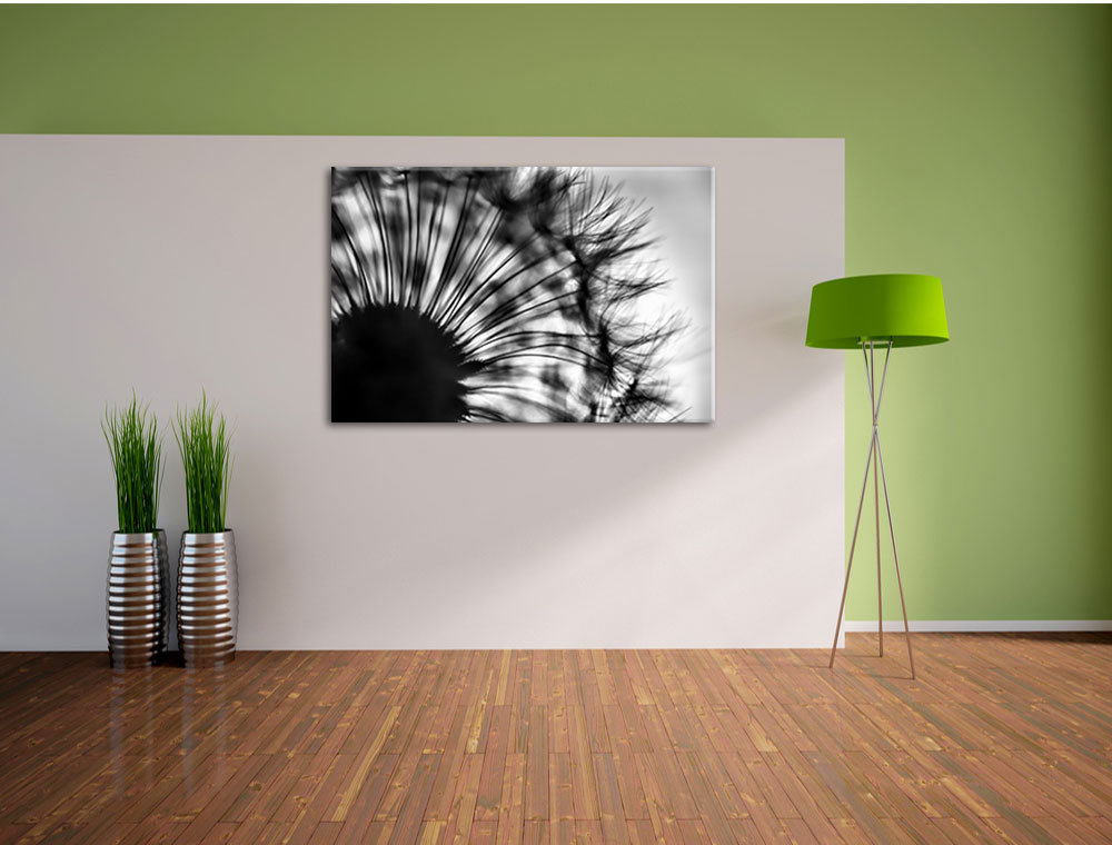 Leinwandbild Pusteblume vor grauem Hintergrund in Monochrom