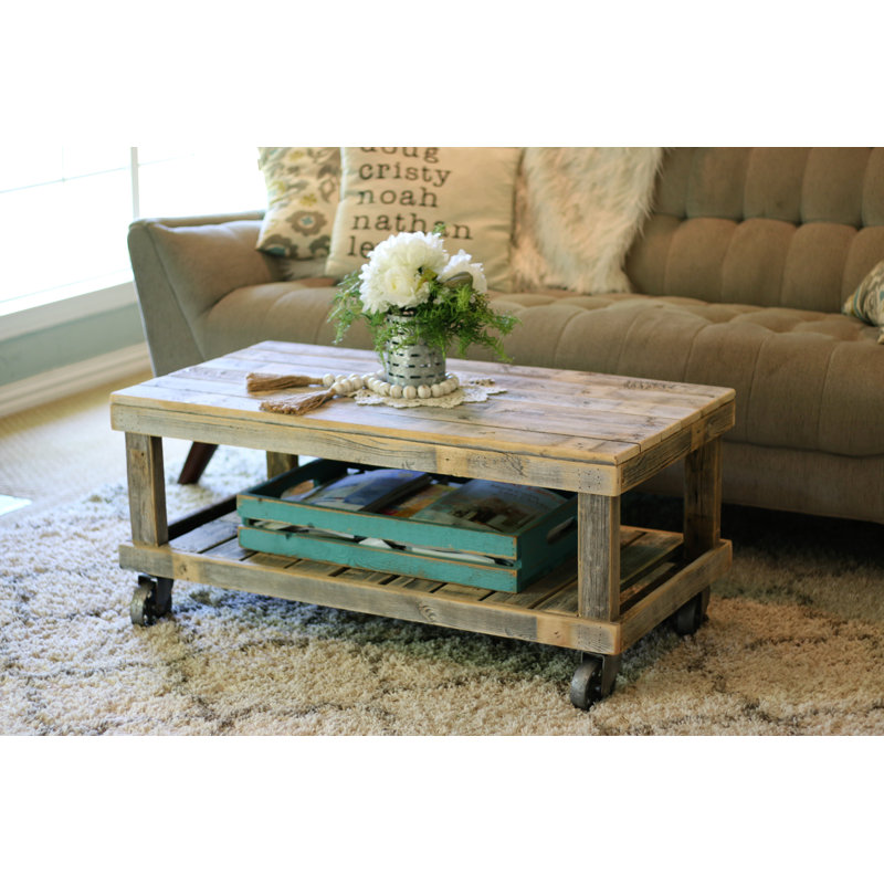 Table basse avec pieds en bois massif avec rangement Leos