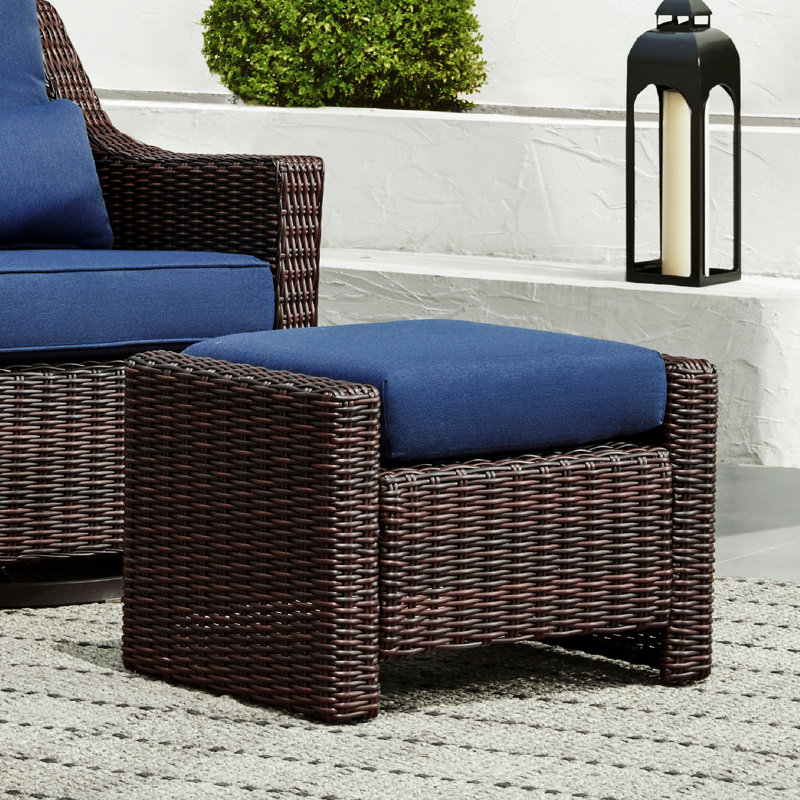 Fauteuil de patio pivotant avec repose-pieds Keaisha, Bleu/brun