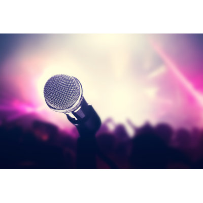 Microphone On Stage by NiseriN - Wrapped Canvas Print