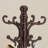 Vintage Birchwood Floor-Standing Coat Rack With A Stable Triangular Base And 14 Hooks. A Classic Design Suitable For Entryways Or Offices.