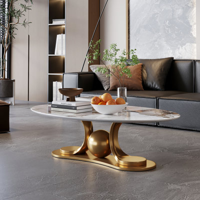 Table basse en métal doré avec piédestal en acier inoxydable et plateau en faux marbre
