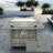 Propane Gas Fire Pit Table With Glass Wind Guard And An Open Basket-wave Patterned Wicker-1550162228