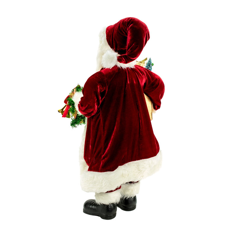 Père noël traditionnel avec cloche et sac de noël