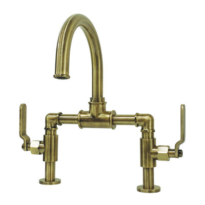 Kingston Brass Whitaker Two-Handle 2-Hole Deck Mount Bridge Bathroom Faucet with Pop-Up Drain