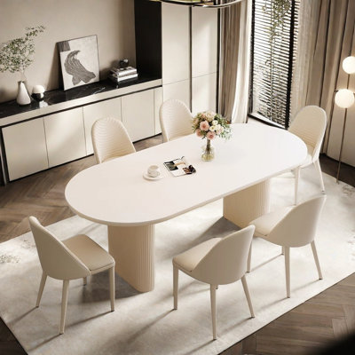 Table à manger ovale simple de style crème et chaise