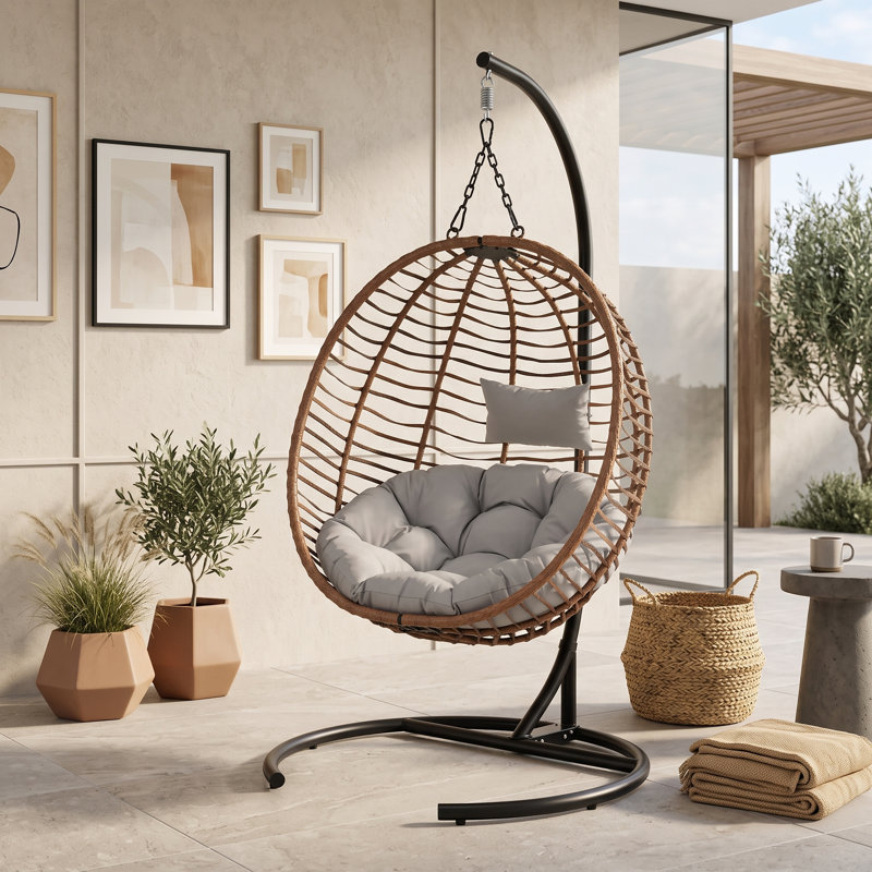 Fauteuil à œufs pliable extérieur / intérieur avec osier PEHD, structure en fer, coussin épais, appui-tête réglable et sangle de sécurité