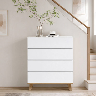 Commode blanche moderne à 4 tiroirs, commode de rangement élégante sans poignée avec pieds en bois naturel massif, armoire à profil bas minimaliste, unité de rangement multi-scène facile à assembler pour la chambre à coucher et le salon