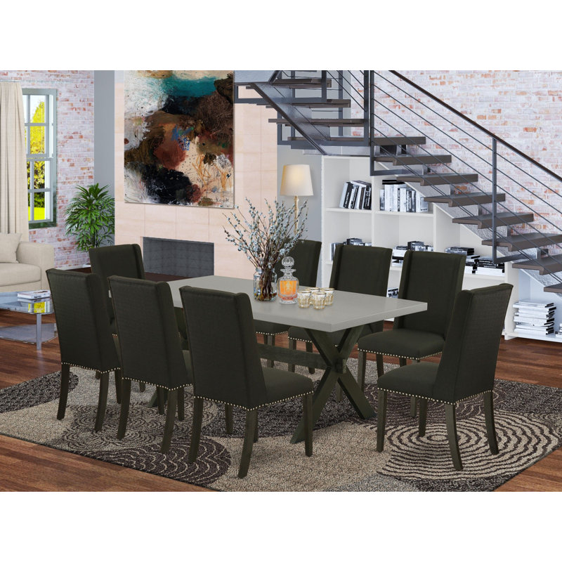 Ensemble de table de salle à manger 9 pièces moderne comprenant une table de salle à manger rectangulaire avec pieds en X et 8 chaises Parsons en tissu bleu, finition noire brossée