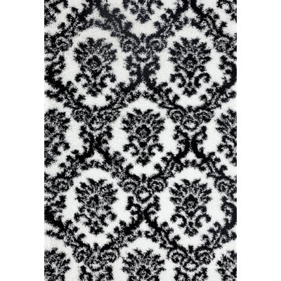 Tapis intérieur/extérieur blanc/noir oriental Milne