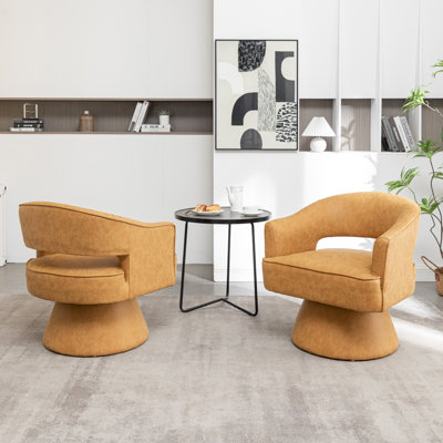 Fauteuil demi-tonneau pivotant en similicuir Kiersten