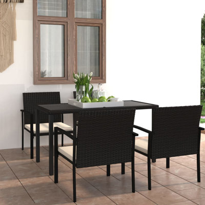 Catherene 4 - Person Patio Dining Set with Rectangular Table , Cushions Included