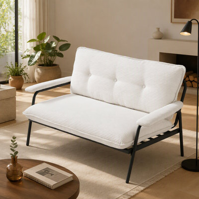 Canapé confortable et polyvalent pour les petits espaces, idéal pour diverses activités, de regarder un film à travailler