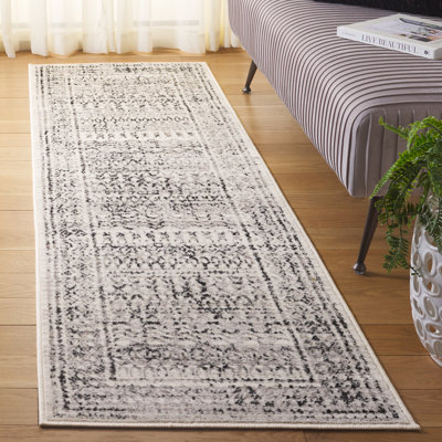 Lamarianna Temple Bcf/Jute/Latex/Overlock Southwestern Rug in Ivory/Grey Black
