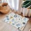 Tapis tressé Golden Summer Blooms-106464346