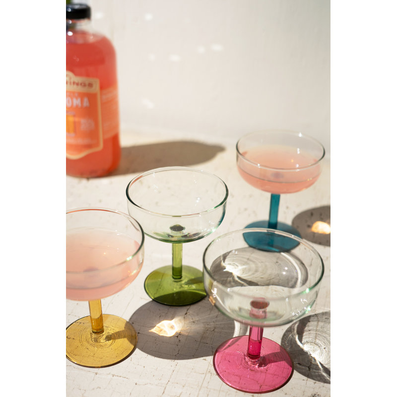 SET OF FOUR COUPE GLASSES WITH COLORED STEMS - ONE EACH