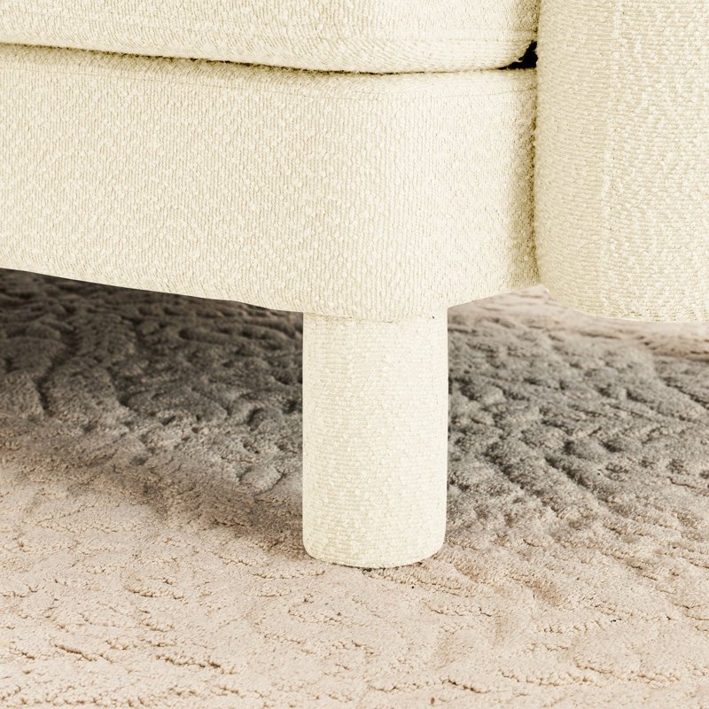 Beige, canapé modulaire en tissu Boucle, configuration de siège amovible et confortable, caractéristique des réunions de famille à la maison, rembourrage en mousse dense, structure en bois, époque