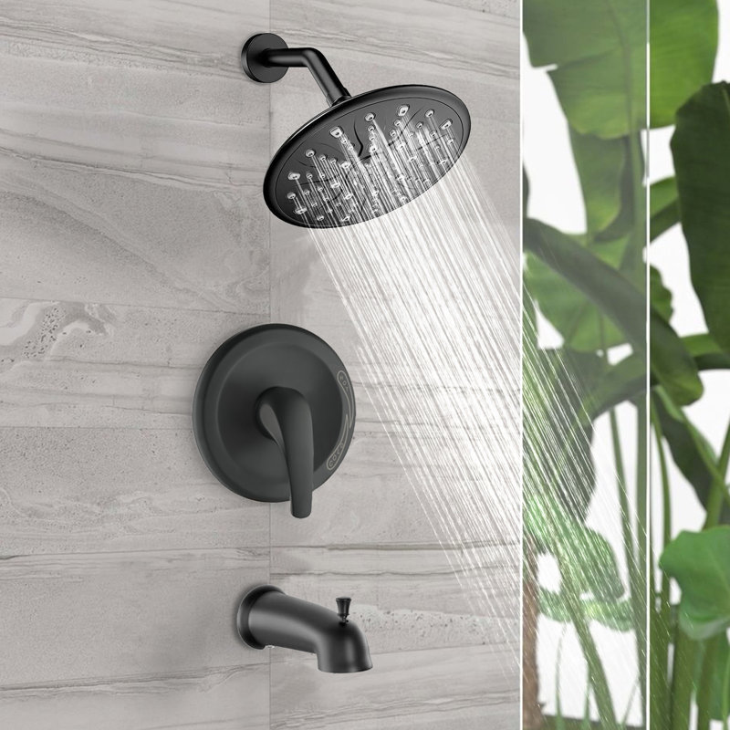 Douche à poignée simple en noir mat foncé. Comprend une pomme de douche à pluie, une douche à main, un bec de baignoire et une valve. . 1,8 gallon par minute. 360 ° réglable. Poignée de robinet murale noire. Comprend et GPM. Corrosion.