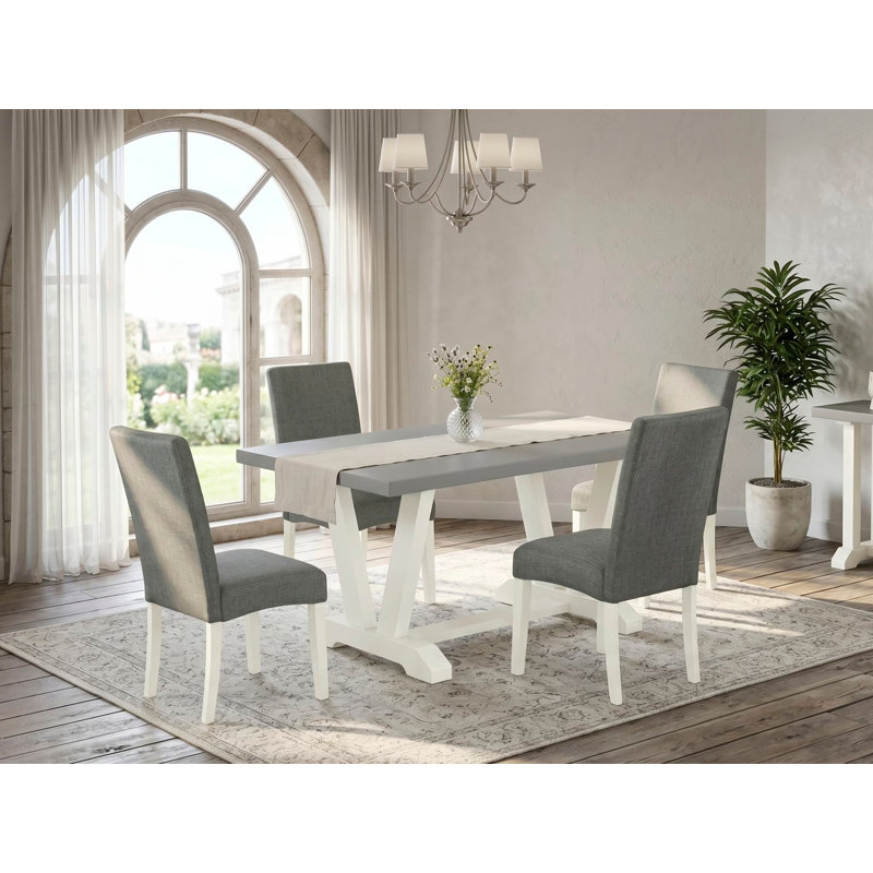 L'ensemble 5 pièces comprend une table rectangulaire en bois ciment avec des pieds en V et 4 chaises de salle à manger Parsons en lin gris, lin brossé blanc