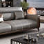 Causeuse-coussin en similicuir gris