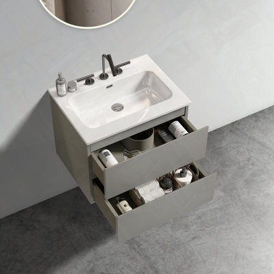 Meuble-lavabo mural avec lavabo en céramique et trois trous de robinet