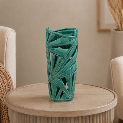 Vase en cÃ©ramique vert feuille avec dÃ©coupes
