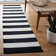 Brookvale Striped Hand-Woven Cotton Area Rug in Black/Ivory