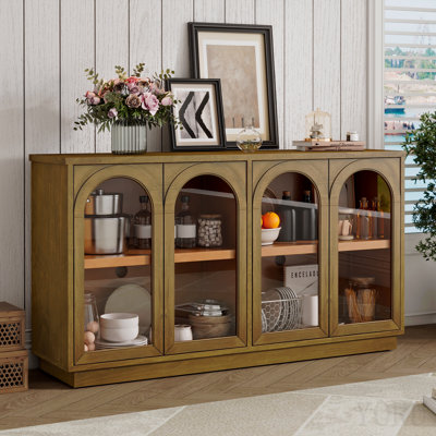 Grande armoire à 4 portes avec portes en verre au fini pin vieilli. Perspectives arquées élégantes. De nombreuses options de rangement. Tablettes réglables. Construire. Capacité de charge supérieure de 200 lb. 52 tenant 250 fond